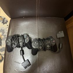 Two OG PS2 Remotes 