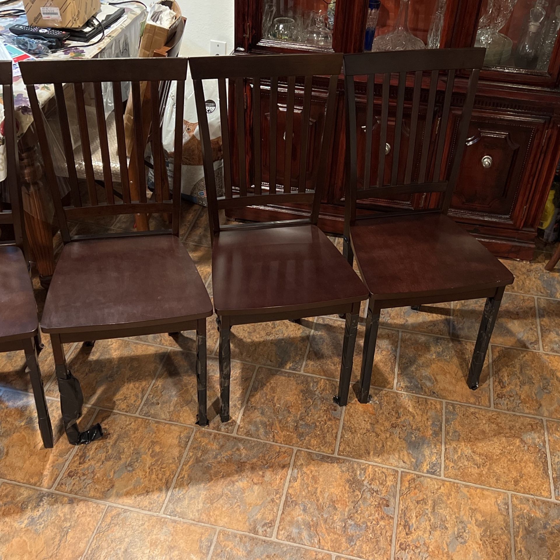 Four Wooden Chairs 