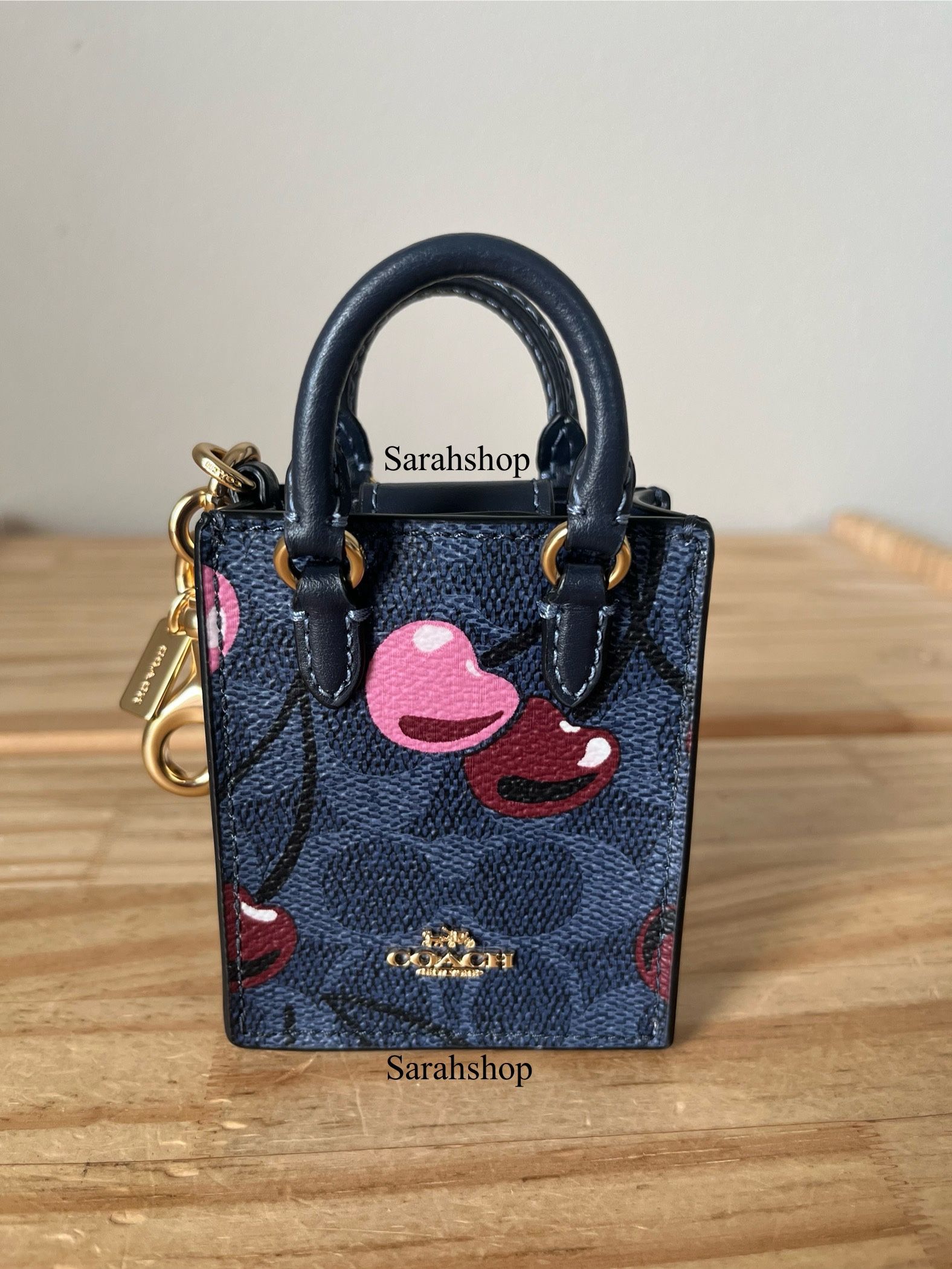 Coach North/South Mini Tote Bag Charm In Signature Canvas With Cherry print 