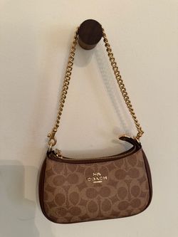 used like new mini terri coach purse