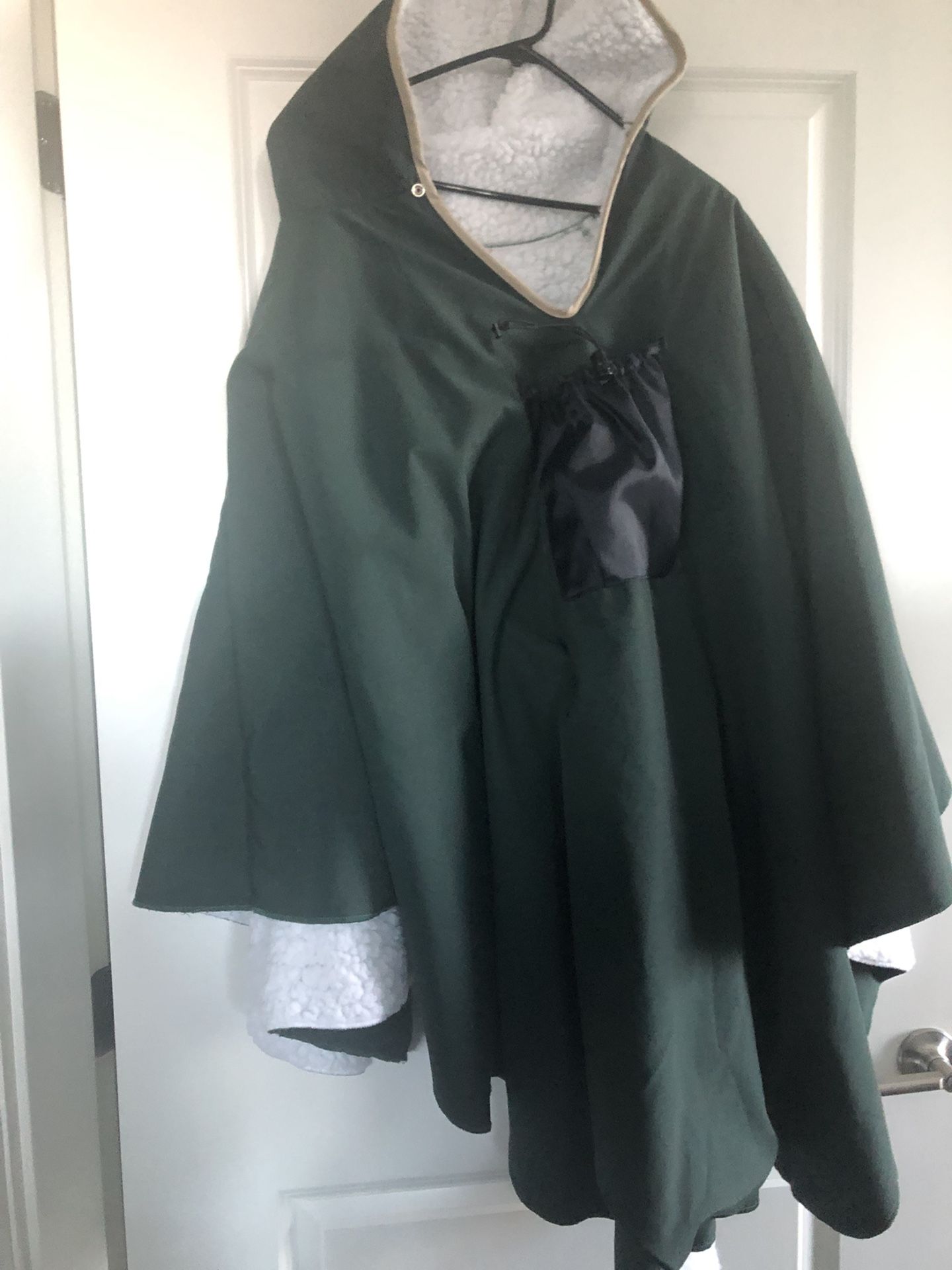 New, water-repellent, insulated poncho