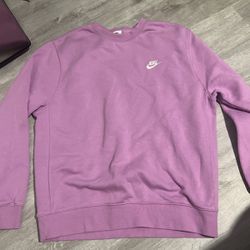 purple Nike sweatshirt