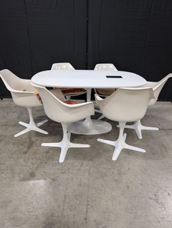 White Oval Table with Six Pedestal Chairs with Cable Cubby