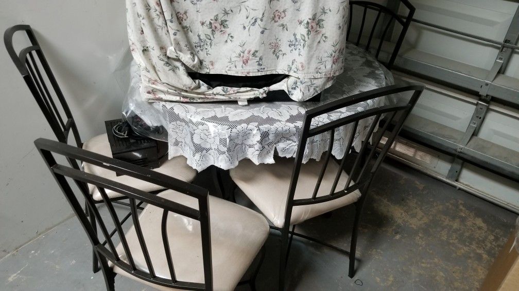 Breakfast table with four chairs