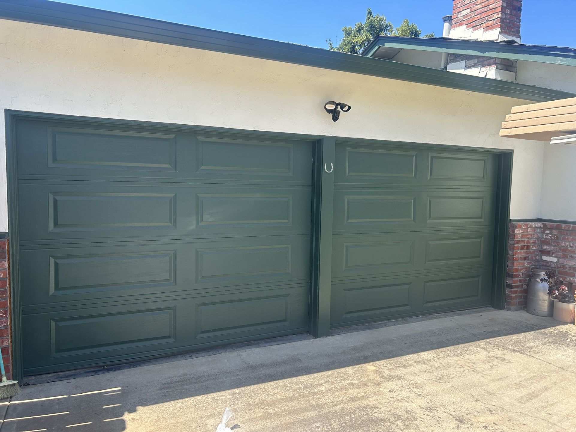 Two Used 9x7 Garage Doors