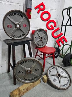4 Rogue 45LB Machined Olympic Weight Plates. Homestead 33033. Delivery fee.

Heavy-duty cast-iron Rogue 45lb machined Olympic weight plates come in a 