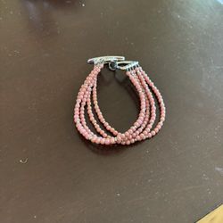 beautiful rose/pink triple strand beaded bracelet