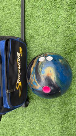 Storm streamline bowling ball with roller bag