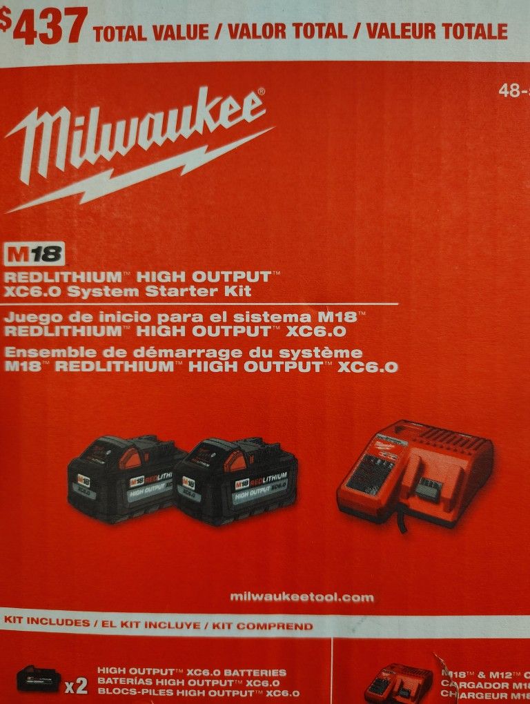 Milwaukee Two 6.0ah High Output Batteries And Charger
