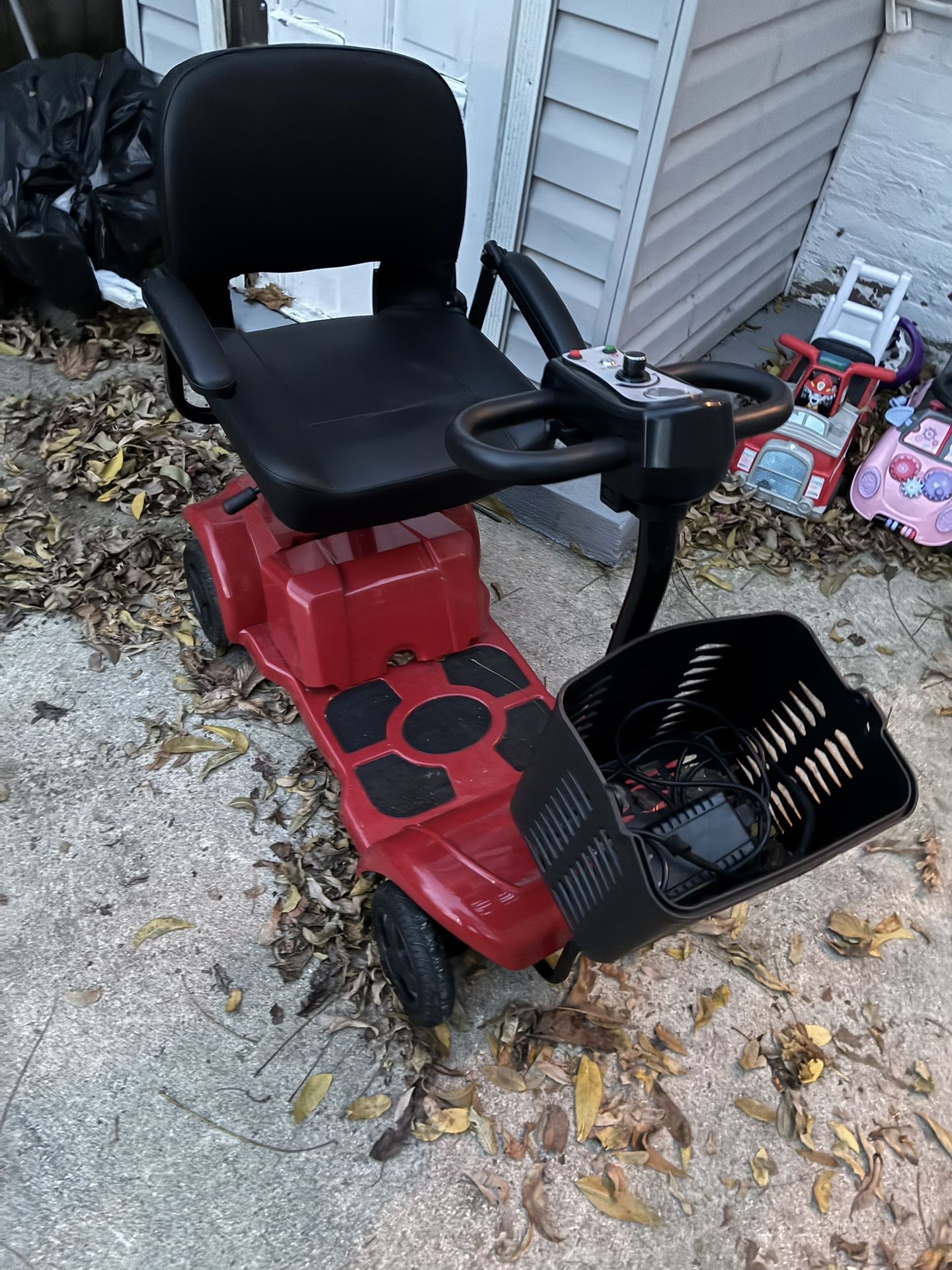 a four-wheel electric mobility scooter.