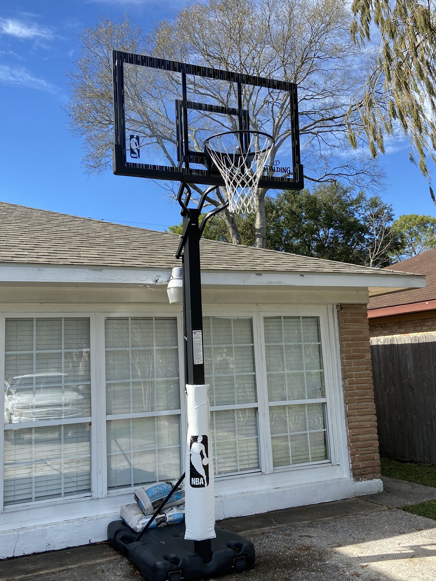 Spalding 60 In. Acrylic Screw Jack Portable Basketball Hoop System