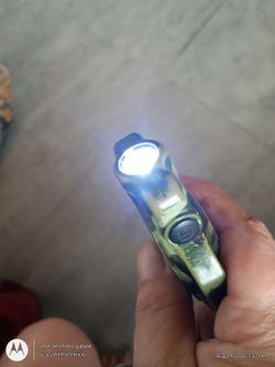 Survival tool lighter/flashlight