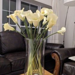 10 Lilies In A Tall Glass Vase