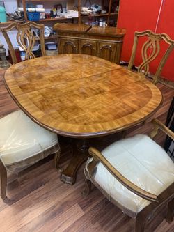 Elegant dining room table with (6) chairs (2 leafs) buffets and china cabinet