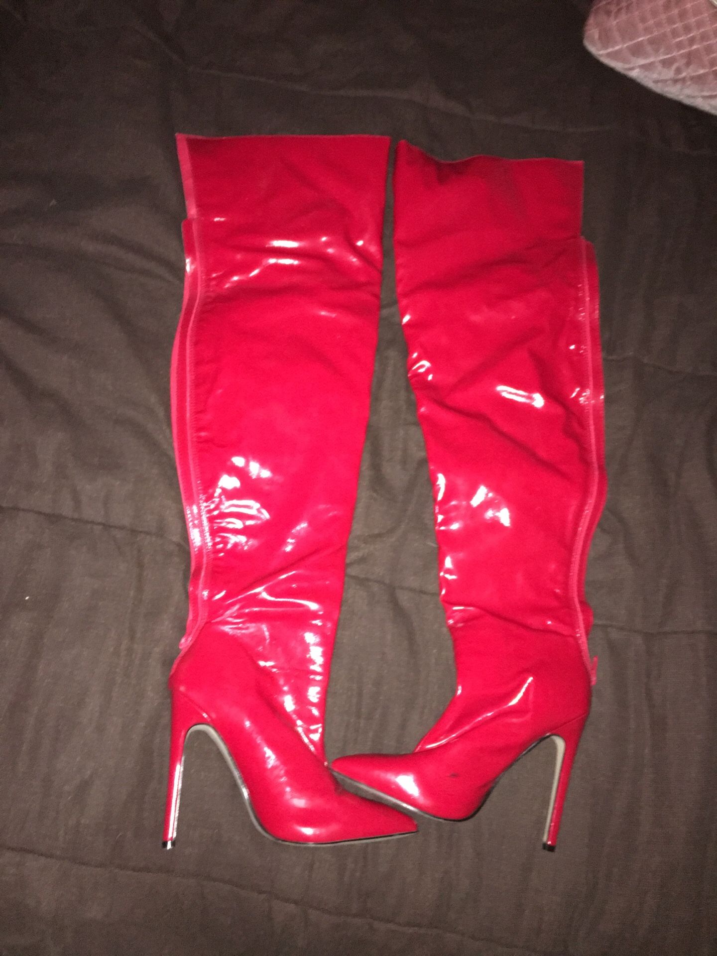 Thigh high red leather boots