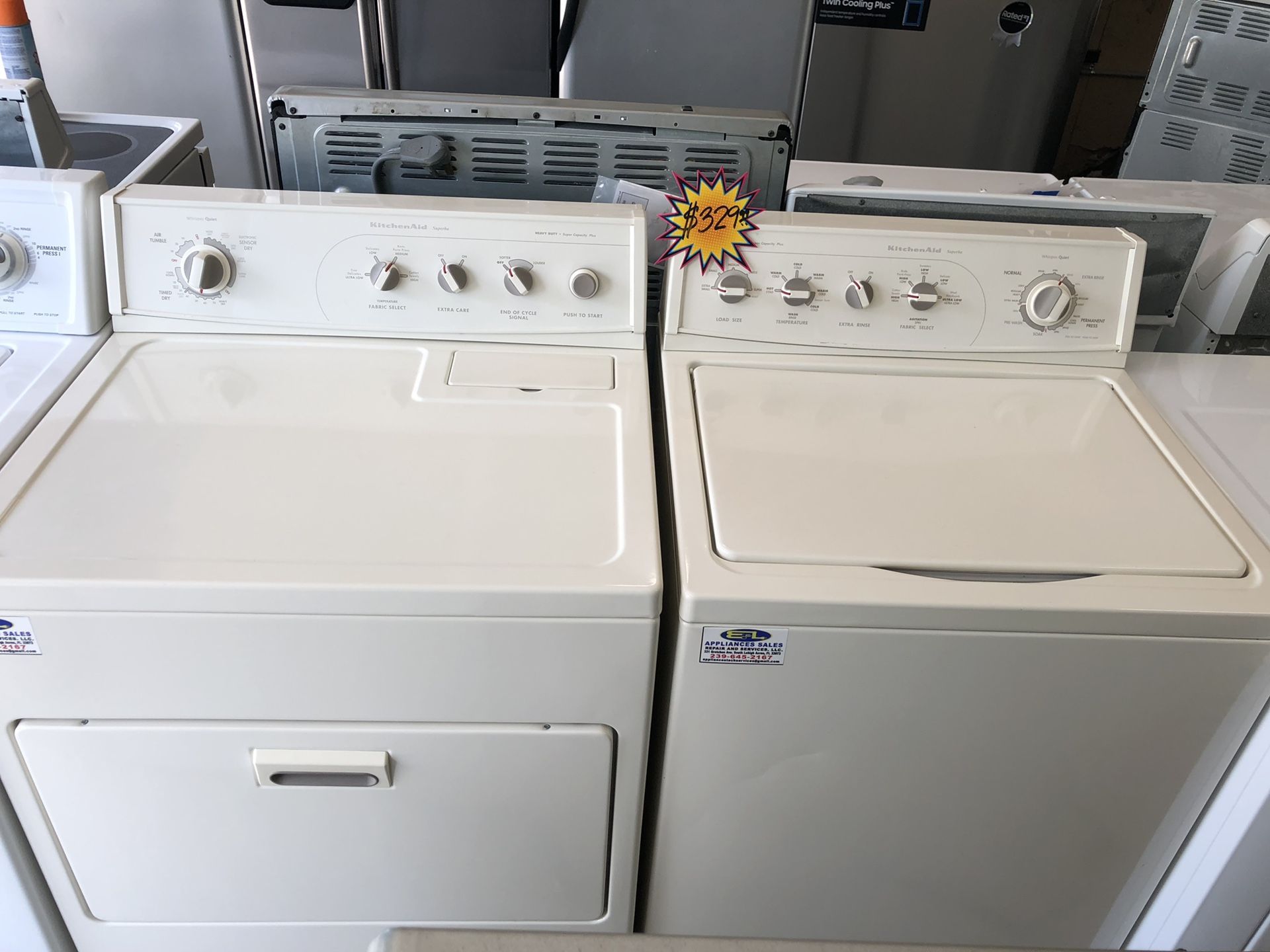 An almond Kitchen Aide set of washer and dryer