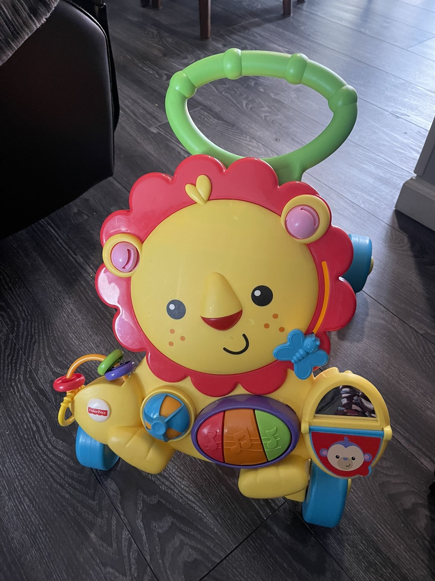 Fisher-Price Musical Lion Walker sit and stand play