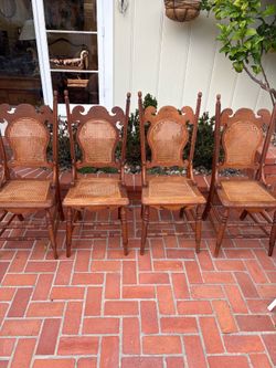 Set of 4 vintage cane-back dining chairs