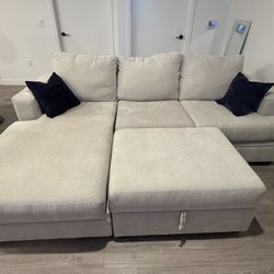 Bonaterra Sand Sectional + Storage Ottoman (Living Spaces)