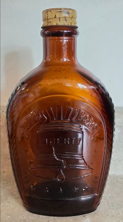 Vintage Log Cabin Syrup Glass Amber Bottle Liberty Bell 1776 to 1976