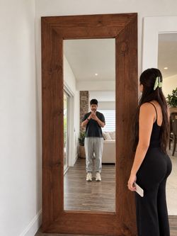 7 FOOT HANDMADE MIRROR. Solid wood frame, built by us. Free delivery. I need the space back, so it is priced to move this week.