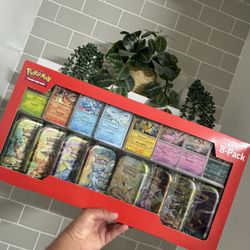 Prismatic Evolution 8 PK Costco Mini Tins