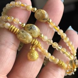 Rutile Quartz Stretchy Beaded Necklace  22 in length  The largest accent bead is yellow fluorite 💛 