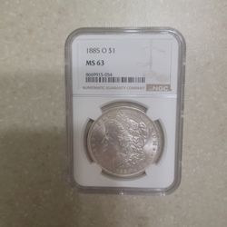 1885 O Morgan Silver Dollar.  Graded 
