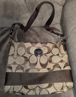 Coach Pocketbooks $40 Each