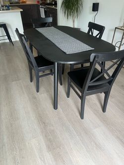 Oval black dining set