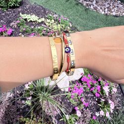 2 brand bracelets, and 1 with eyes