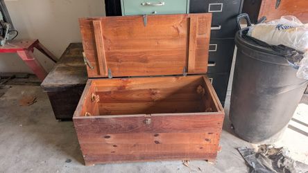 Rustic wooden storage chest with hinged lid