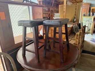 Two black barstools