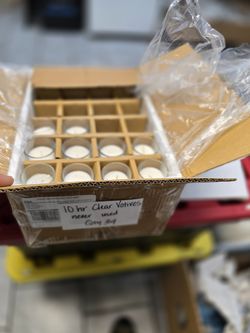 34- Unused glass votives in box