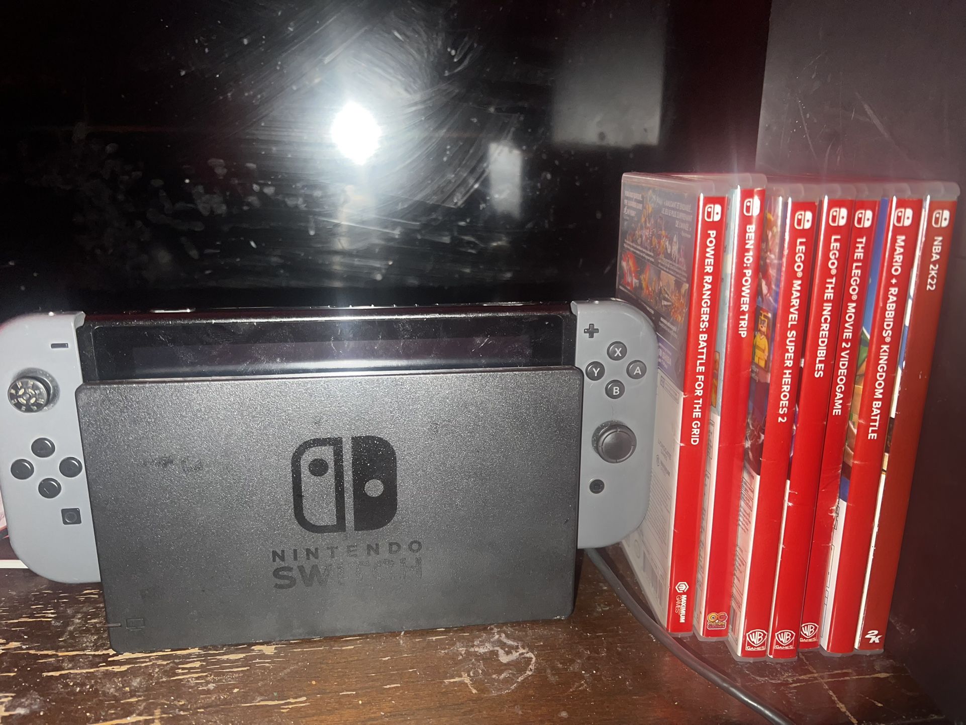 nintendo switch in great condition, comes with everything except a hdmi cord, comes with games and a wired pro controller