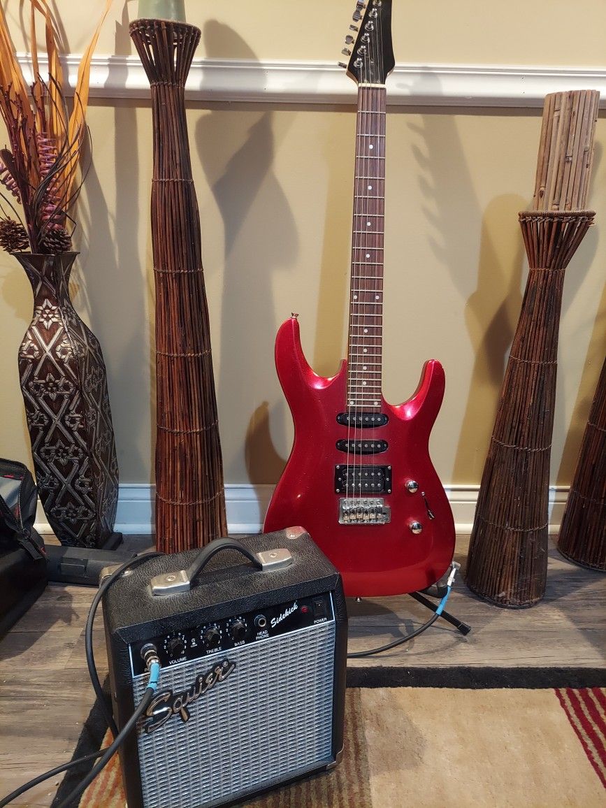 electric guitar with amplifier and stand