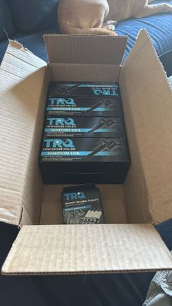 TRQ 4 Ignition Coils And 4 Iridium Spark Plugs