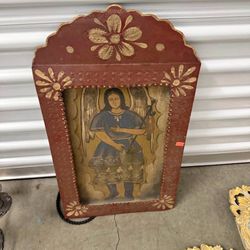 hand-painted retablo of an angel.