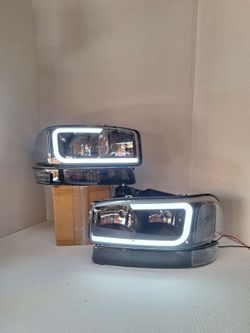 GMC SIERRA  1999/2006 HEADLIGHTS