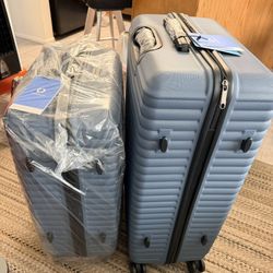 2 Piece Luggage Set, New, 4-Wheeled.