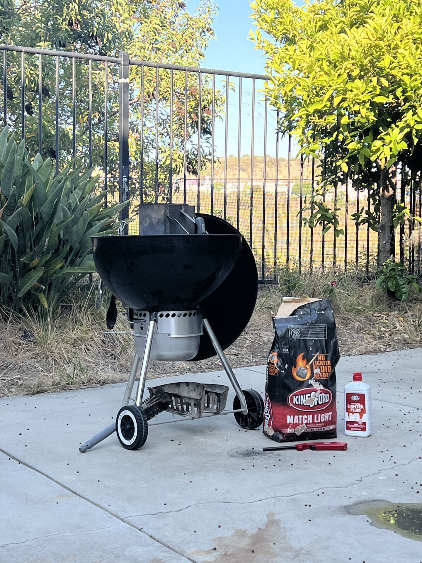 Moving sale Weber Original Kettle Premium Charcoal Grill, 22-Inch with half bag charcoal, Black