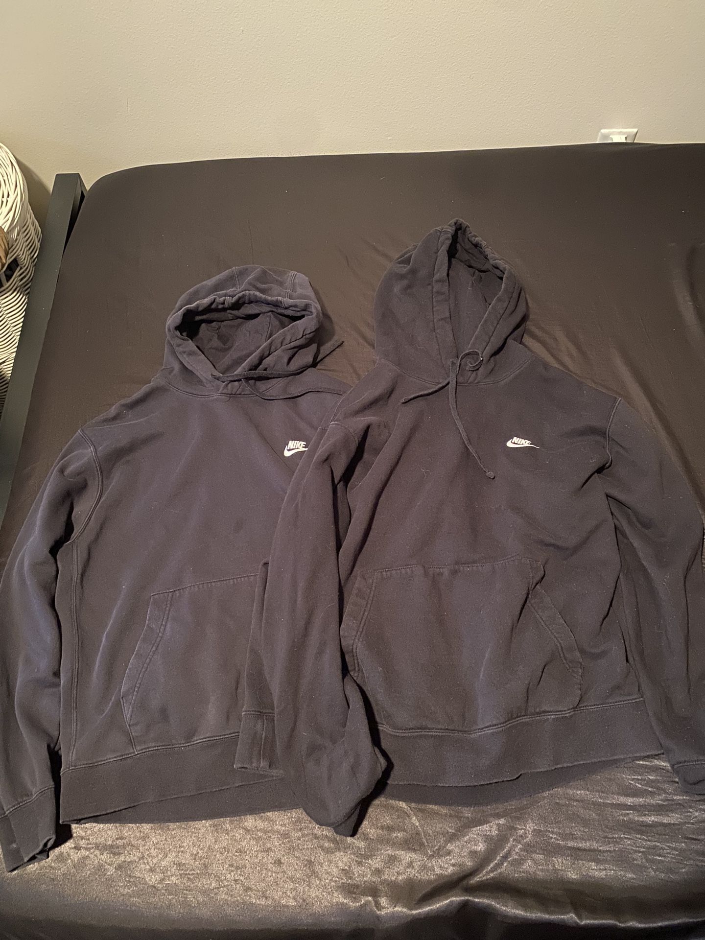 Large black Nike hoodies