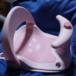 Baby.
Baby bath seat reclinable With section cups on bottom fifteen firm