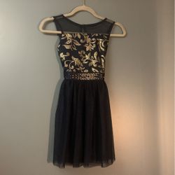 Girls size 10- Gold and a navy blue dress.