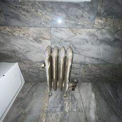 Cast Iron Hitting Radiator 