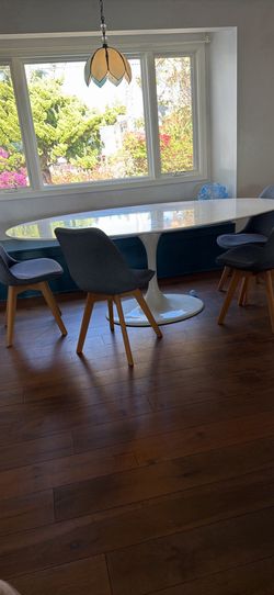 White table oval table and chairs
