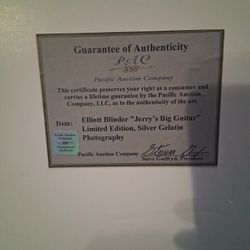 A Real Photo Of Jerry Garcia Holding One Of His Guitar.