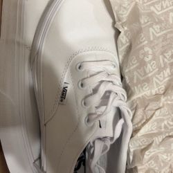 White laced Vans 