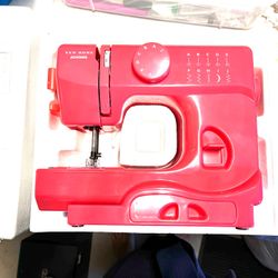 Girls Sewing Machine. Janome Lightning
