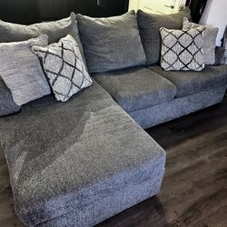 grey couch & single seater 